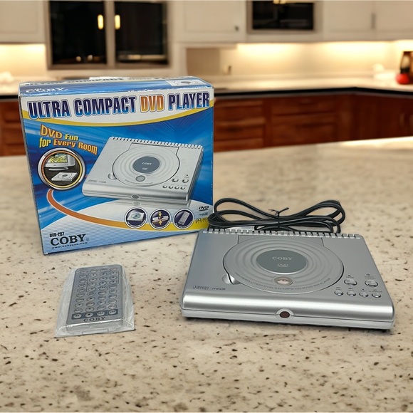 Coby DVD-207 Portable DVD Player Ultra Compact MP3/CD/CD-R/CD-RW - New Open Box - Picture 1 of 6